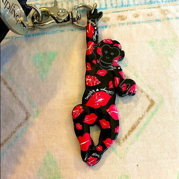 Very Rare: Fergie for Kipling "The Kiss" Coin Keychain - Picture 3 of 7